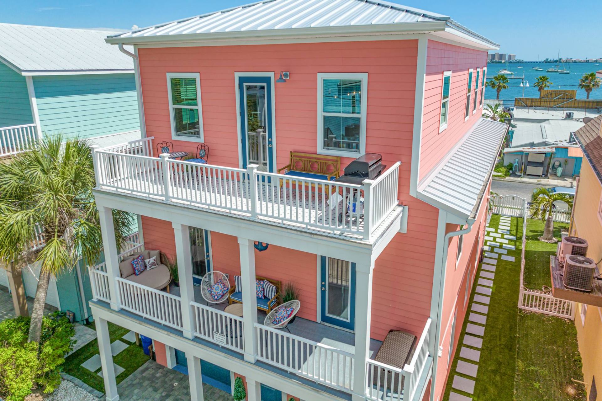 Aerial view of Blush by the Bay with bay backdrop