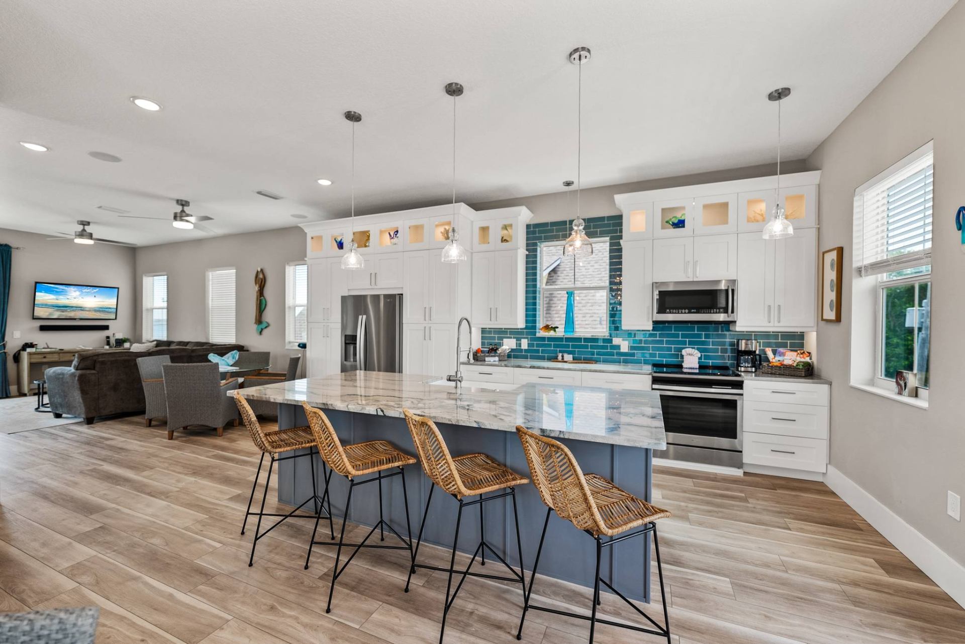 Kitchen island bar seating open to the living room