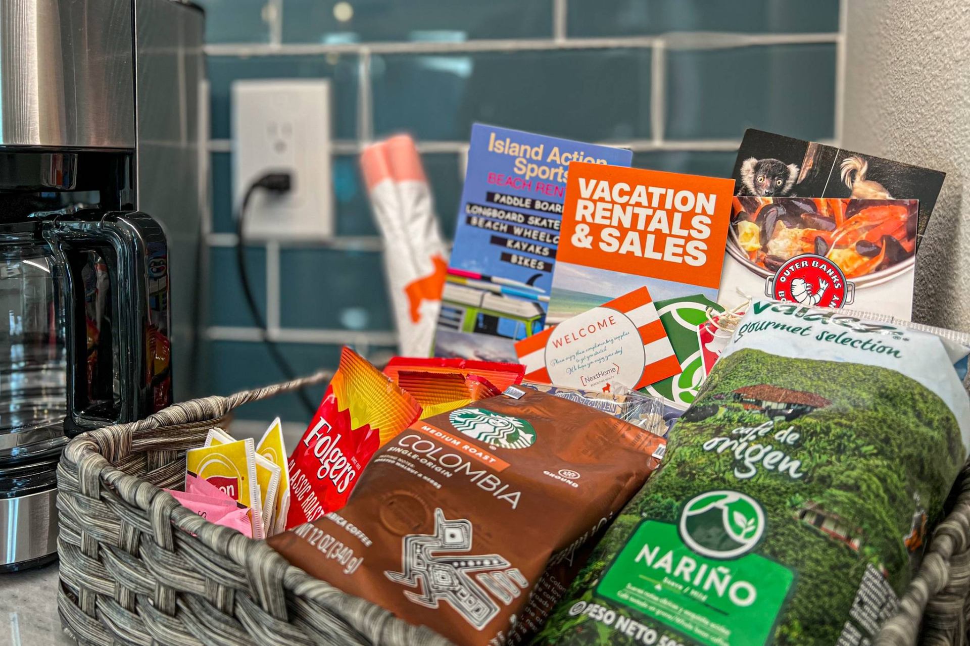 Welcome basket close-up with coffee, snacks, and guides