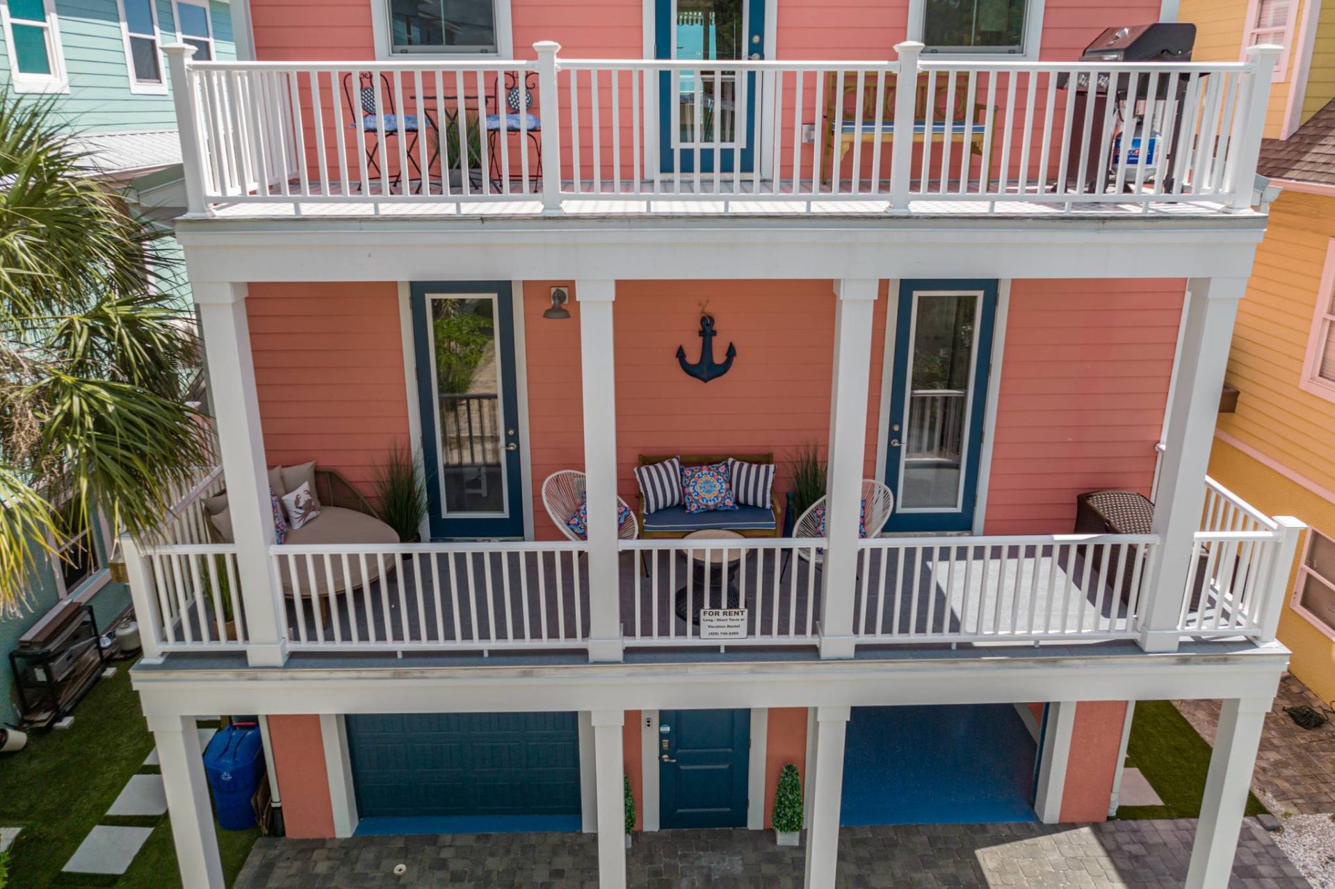 Front balconies and entry of the coastal beach house